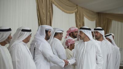 Sheikh Abdullah bin Zayed, Minister of Foreign Affairs and International Cooperation and Mohammed Al Mazrouei, Undersecretary of the Crown Prince Court of Abu Dhabi (back R), offer condolences to the family of Ahmed Mohamed Al Zayoudi who passed away while serving with the Armed Forces in ‘Operation Restoring Hope’. Mohamed Al Hammadi / Crown Prince Court - Abu Dhabi