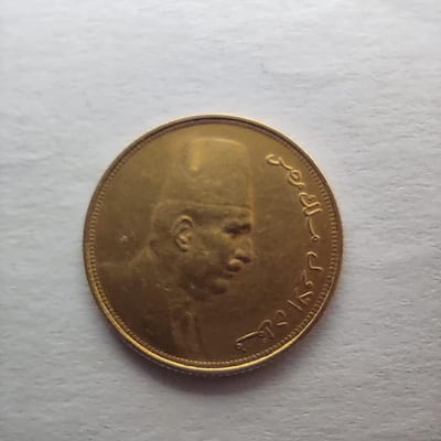 A coin bearing the face of Egypt's penultimate monarch, King Fuad I, was also found.