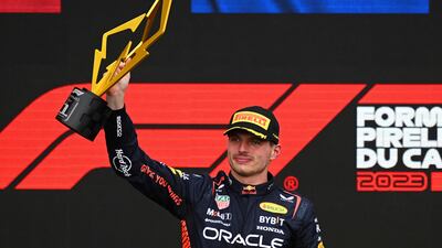 Max Verstappen celebrates on the podium after winning the Canadian Grand Prix at Circuit Gilles Villeneuve on June 18, 2023. AFP