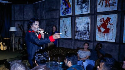 Make-up typically takes an hour, changing his customised outfit for every song. Victor Besa for The National