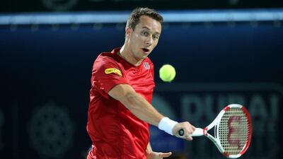 Philipp Kohlschreiber of Germany returns the ball to Thiemo De Bakker of Netherlands during their first round match of the Dubai Duty Free Tennis ATP Championships in Dubai on February 24, 2014. EPA/ALI HAIDER