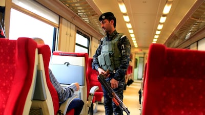 A policeman guards a carriage of the train from Baghdad to Fallujah. Reuters