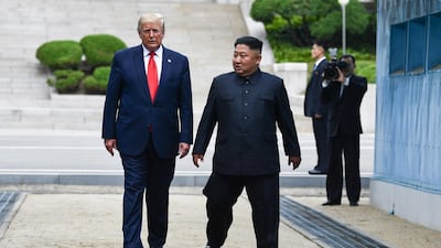 US President Donald Trump meets with North Korean leader Kim Jong-un at the demilitarised zone separating the two Koreas, in Panmunjom, South Korea. AFP