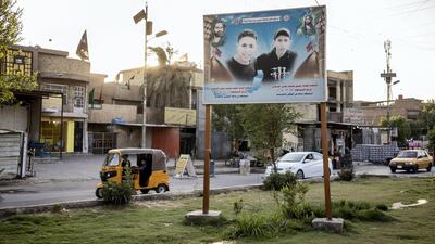 A poster of the brothers showing across the street from their house. Haider Husseini for The National
