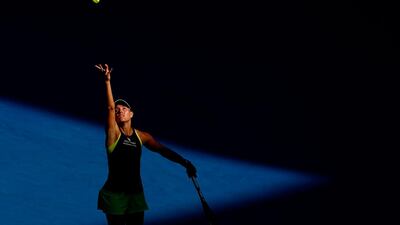 Angelique Kerber serves during her semi-final match against Simona Halep. Michael Dodge / Getty Images