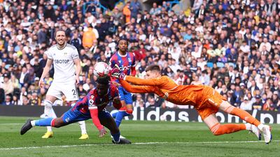 Crystal Palace's Jeffrey Schlupp challenges Leeds United's Illan Meslier. Reuters
