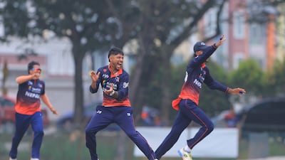 Sandeep Lamichhane celebrates a wicket for Nepal at the Bayuemas Oval