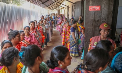 Bangladeshi voters queue at a polling station in Dhaka. EPA