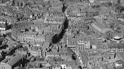 Derby city centre in 1921, looking up at the Corn Market and Iron Gate