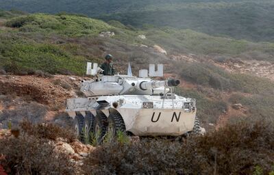 A United Nations peacekeeper in an armoured vehicle in Naqoura, southern Lebanon, near the border with Israel on August 31. Reuters