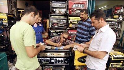 Residents purchase generators at a Baghdad store. With electricity supply vastly overstretched, Iraqis have had to endure power outages for years.