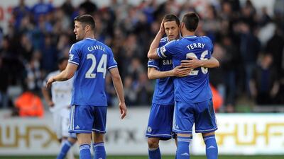 John Terry of Chelsea embraces teammate Nemanja Matic at full-time following their Premier League match between against Swansea City at the Liberty Stadium on April 13, 2014 in Swansea, Wales. Chris Brunskill/Getty Images
