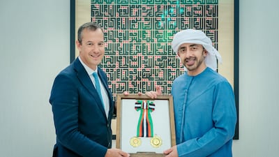 Edward Hobart, UK ambassador to the UAE, receives the First Class Order of Independence from Sheikh Abdullah bin Zayed.