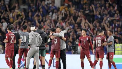 Thailand interim manager Sirisak Yodyadthai celebrates the draw.