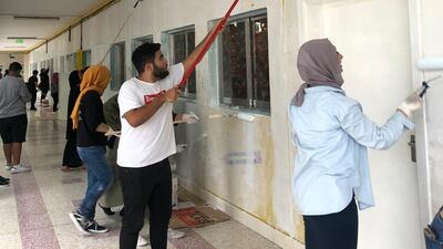 More than 200 university students helped out with a charitable school project in Sharjah.