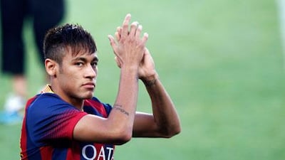 Neymar is with his Barcelona teammates conducting coaching clinics in Israel and Palestine. Gustau Nacarino / Reuters