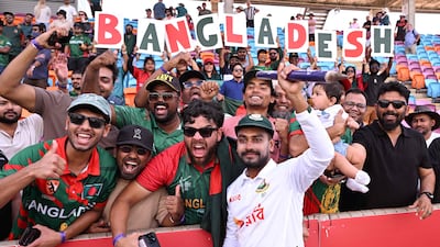 Bangladesh all-rounder Mehidy Hasan Miraz poses with fans after victory over Australia in the first Test in Darwin. AFP