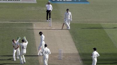 England bowler Sam Curran celebrates after dismissing New Zealand's Kane Williamson. AP