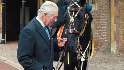 King Charles III with Noble, a mare gifted to him by the Royal Canadian Mounted Police. AFP.