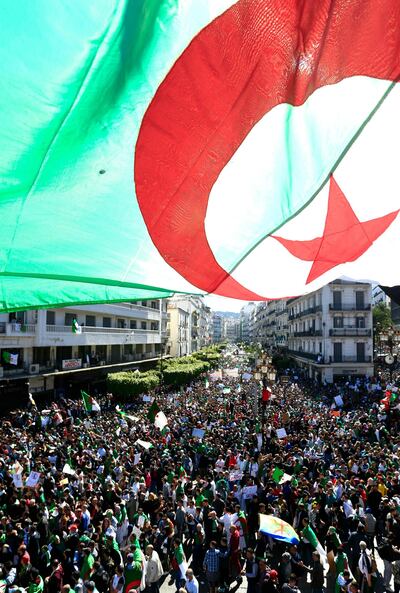Tens of thousands of people gathered Friday in Algeria's capital and other cities amid heavy security for what could be decisive protests against longtime leader Abdelaziz Bouteflika. AP
