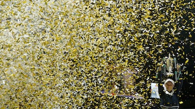 Denmark's Caroline Wozniacki celebrates with the trophy after winning the final against USA's Venus Williams. Edgar Su / Reuters
