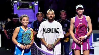 Jasmine Paolini, left, Al Hilal star Neymar and Elena Rybakina during the coin toss. EPA