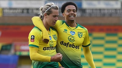 Norwich City's Todd Cantwell, left, celebrates after after levelling the scores. AFP