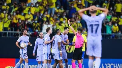 Barcelona midfielder Frenkie de Jong is shown a red card by the referee Carlos del Cerro. Getty Images