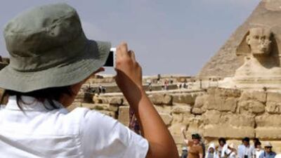 Unprepared tourists are easy prey for aggressive touts in Giza.