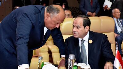 Egyptian President Abdel Fattah El Sisi (R) speaks with Egyptian Foreign Minister Sameh Shoukry during the 29th Arab Summit, in Dhahran, Saudi Arabia, on April 15, 2018. EPA