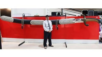 Artist Emad Ghalghay crafted what could be the world's longest sword, on public display for the first time at Adihex this week. He also showcased a three-metre long dagger.