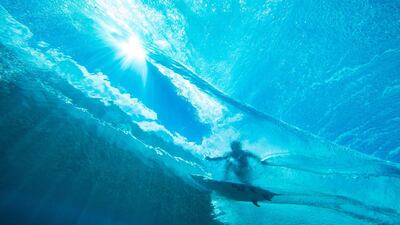 Tatiana Weston-Webb from Brazil rides the swell in Teahupoo, Tahiti, during a freesurf session at the 2019 Tahiti Pro event. AFP