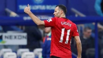 epa03597211 Ryan Giggs of Manchester United celebrates a goal during the English Premier League soccer match between Queens Park Rangers and Manchester United at The Loftus Road Stadium, in London, Britain, 23 February 2013. EPA/TAL COHEN DataCo terms and conditions apply. http://www.epa.eu/downloads/DataCo-TCs.pdf *** Local Caption *** 03597211.jpg