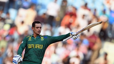 South Africa's Quinton de Kock celebrates after scoring a century against Australia at the Men's Cricket World Cup in Lucknow, India. AFP