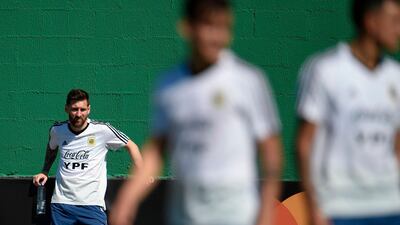Argentina'sLionel Messi watches his teammates during a training session in Rio de Janeiro. AFP