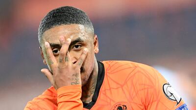 Netherlands' forward Steven Bergwijn celebrates scoring. AFP