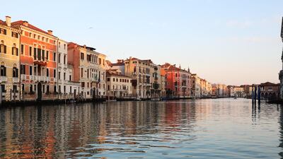 The Grand Canal is seen unusually quiet due to the absence of tourists in Venice, Italy. Getty Images