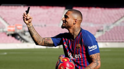 Kevin-Prince Boateng takes a selfie during his official unveiling as a new Barcelona player at Camp Nou. Reuters