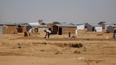 Sudanese refugees build a house of clay bricks, amid the ongoing conflict in their country, in the Iridimi refugee camp, northwest of the town of Iriba, in Wadi Fira province, eastern Chad, November 27, 2025. Reuters