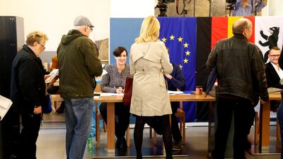 People queue to vote in Berlin during the German general election on September 24, 2017. Fabrizio Bensch / Reuters