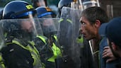 A demonstrator squares up to officers during a protest in Southampton, southern England, over the police handling of the murder of student Henry Nowak. Vickrum Digwa was jailed for life for stabbing the teenager with blade he said he carried as part of his Sikh faith. Body camera footage of Mr Nowak, who was handcuffed by police after Digwa falsely accused him of racial abuse, has sparked outrage. AFP
