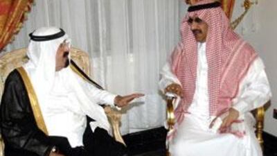 The Saudi King Abdullah, left, meets Prince Mohammed bin Nayef after the attack on him in Jeddah.