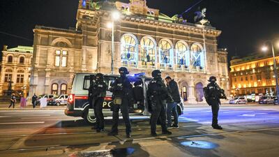 Heavily armed police stand outside the Vienna State Opera following shots fired in the city centre last month in the Austrian capital. Getty Images