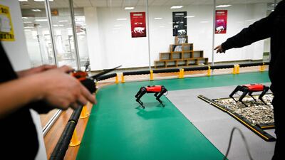 An AlphaDog quadruped robot being remotely controlled in a workshop at the Weilan Intelligent Technology Corporation in Nanjing, China's Jiangsu province. Wang Zhao / AFP