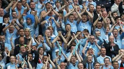 LONDON, ENGLAND - APRIL 16: Manchester City fans cheer during the FA Cup sponsored by E.ON semi final match between Manchester City and Manchester United at Wembley Stadium on April 16, 2011 in London, England. (Photo by Dean Mouhtaropoulos - The FA/The FA via Getty Images)