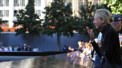 Alicia Watkins remembers a friend who died at the Pentagon during a ceremony marking the 11th anniversary of the September 11 attacks at the National September 11 Memorial at the World Trade Center site.