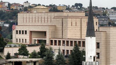 A mosque's minaret is seen backdropped by the United States consulate building in Istanbul. AP