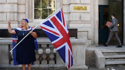 An anti-Brexit campaigner protests outside a war cabinet meeting at the Cabinet Office in London. EPA