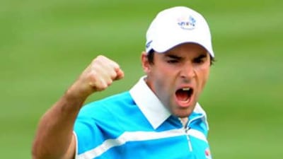 Oliver Wilson of the European team celebrates a birdie putt on the 17th green during the morning foursome matches on day two of the 2008 Ryder Cup at Valhalla Golf Club.