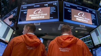 Specialist traders work at the post that trades Alibaba during the company’s initial public offering. Brendan McDermid / Reuters